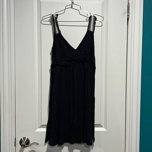 Guess jeans dress. Tie back. Braided shoulder straps. Size medium.